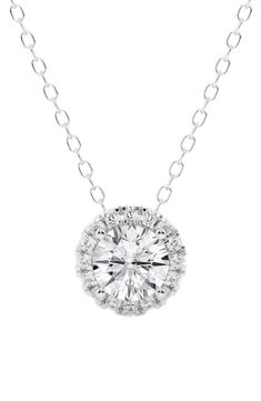 A round lab-created diamond halo pendant brings luxurious sparkle to a dainty necklace crafted from polished 14-karat gold. Total lab-created diamond weight: 0.63ct. Color: G+ Clarity: VS–SI 14k gold/lab-created diamond Imported Diamond Guide Halo Necklace, Round Halo, Diamond Guide, Halo Pendant, Necklace Craft, Diamond Pendant Necklace, Keep Jewelry, Diamond Halo, Gold Set