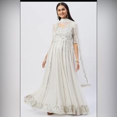 Featuring White Anarkali In Georgette Base, Embroidered With Gota , Sequence And Nakshi Work. It Is Paired With Emdroidered Dupatta In Net Base. Fabric Composition : Georgette , Net Fit: Fitted At Bust Lining Material: Semi Crepe Neck Type: Deep Round Closure Used: Concealed Zipper Embroidery & Embellishments: Gota Zipper Embroidery, White Anarkali, Embroidery Embellishments, Work It, Anarkali, Embellishments, Red And White, Composition, Womens Sizes