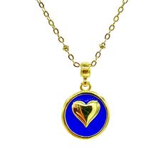 Brass necklace with 18kt gold plating. Enamel heart design. If you have any questions or need assistance, please contact us via Instagram @marcesjewelry. --- Collar en bronce bañado en oro de 18kts. Si tienes alguna pregunta o necesitas asistencia, por favor contáctanos a través de Instagram (@marcesjewelry). Gold Heart Necklace With Tarnish Resistant Round Pendant, Gold Heart Necklace With Round Pendant, Tarnish Resistant, Gold Sterling Silver Heart Choker Necklace, Gold Plated Heart Necklace For Her, Valentine's Day Tarnish Resistant Necklace, Blue Heart Charm Necklaces, Gold Round Charm Necklace With Heart Charm, Gold Heart Beads Pendant Necklace, Gold Necklace With Heart Charm And Round Pendant