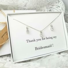 * This necklace is for Bridesmaid Necklace & Earring gift Set.* You can use- Wedding, Mother's Day, Christmas, Valentines day, birthday ….all Party. * Item Description Necklace Length -16.5"  Extension-2 1/4"                  Pendant- L 12m  W-5mmEarring -L-12mm  W-5mm* Material - Cubic Zircon 18K  gold plated over copper.. Gift Box Size (W 3 4/3  L 5 1/4). All ingredients in this product come from Korea  This product come with your choice of jewelry card and gift box.If you want use for oth Cubic Zirconia Jewelry Sets For Wedding And Mother's Day, Cubic Zirconia Jewelry Sets For Wedding On Mother's Day, Elegant Jewelry Sets For Mother's Day Wedding, Elegant Jewelry Sets For Wedding And Mother's Day, Dainty Jewelry Sets As A Gift, Dainty Silver Jewelry Sets As Gift, Dainty Jewelry Sets With Matching Earrings As Gift, Silver Jewelry For Bridesmaid Gift, Dainty Cubic Zirconia Jewelry Set For Gift