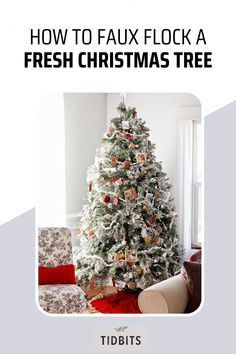 a white christmas tree sitting in front of a window with the words how to faux flocka fresh christmas tree