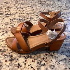 Never Worn, Size 10, Leather Platform Clog Sandal. Brand Mia Casual Brown Wedge Sandals With Stacked Heel, Casual Wedge Sandals With Wood Block Heel, Brown Block Heel Slingback Sandals For Beach, Casual Brown Slingback Sandals With Block Heel, Brown Wooden Heel Wedge Sandals For Vacation, Brown High Heel Mules For Vacation, Brown Stacked Heel Vacation Heels, Open Toe Synthetic Clogs With Wooden Heel, Casual Brown Block Heel Slingback Sandals