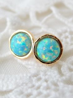 "Mint Opal ring, Gemstone ring, Gold ring, Silver ring, Opal ring, Mint stone ring, October birthstone ring, dainty ring, stacking ring, Textured ring Delicate lovely and classic ring. The ring is made of 14k gold filled that will last for years, and a lovely lab opal gemstone. The stone is 6 mm in diameter. ✤ ✤✤ AVAILABLE ALSO IS STERLING SILVER. JUST CHOOSE AT \"METAL AND STONE COLOR\" BOX. Choose your size at \"size\" box. MATCHING EARRINGS ARE AVAILABLE HERE: https://www.etsy.com/il-en/listi White Opal Stud Earrings, White Opal Earrings, Fire Opal Earrings, Unique Opal, Opal Stud Earrings, Earrings Opal, October Birthstone Rings, White Opal Ring, Stud Earrings Gold