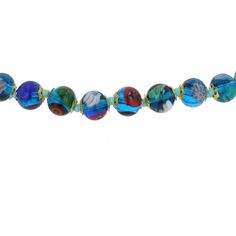 Add a touch of classic Venetian style to your outfit with this elegant Murano millefiori necklace. Centuries-old Murano glass technique perfected by Italian master craftsmen is used to create colorful mosaic effect that is fun and trendy, yet classic and timeless. This is a unique necklace that will add Venetian chic to your jewelry collection and will brighten up your look and your day. Measurements: Each necklace measures 24 inches in length and comes with an attractive velvet pouch and a cert Elegant Turquoise Glass Jewelry, Adjustable Murano Glass Necklace, Adjustable Round Murano Glass Necklace, Formal Blue Glass Jewelry, Turquoise Single Strand Glass Jewelry, Elegant Turquoise Glass Beaded Necklace, Adjustable Multicolor Necklace For Formal Occasions, Turquoise Glass Round Jewelry, Turquoise Round Glass Jewelry