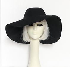 "Wide Brim sun hat made with black linen , lined in rayon print, the hat has a 2 section crown 3 1/2 \" in length and a one piece 5\" brim, a cotton band inside. One size fits most up to 23\" Machine wash cold / hand dry Made in USA Press if needed / packable" Black Wide Brim Sun Hat With Upf 50+, Black Bucket Hat With Upf 50+ And Curved Brim, Wide Brim Sun Hat For Winter Vacation, Black Fedora Sun Hat, One Size Fits Most, Vacation Wide Brim Sun Hat, Black Lightweight Sun Hat With Curved Brim, Outdoor Wide Brim Hat One Size, Wide Brim Outdoor Hat One Size, Wide Brim Hats For Outdoor