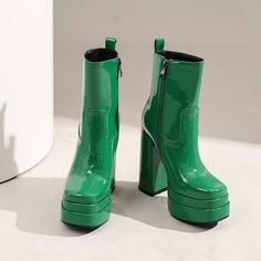 Introducing our newest arrivals ââ‚?the Green Platform Boots! A chic and stylish twist on the classic platform boot. these square-toe beauties are perfect for making a statement. The lush patent leather and chunky block heel add a touch of luxury. while the green hue is perfect for standing out from the crowd. Upper: Patent Leather Lining: Short Plush Outsole: Rubber Toe: Square Toe Closure: Zip Heel: 14cm/5.5'' Platform: 4cm/1.5'' Shaft: 13.5cm/5.3'' Circumference: 25cm/9.8'' Color: Green. Blac Winter Square Toe Platform Boots, Trendy Boots With Lug Sole In Polyurethane, Square Toe Boots With Reinforced Heel, Trendy Polyurethane Boots With Lug Sole, Modern Patent Leather Heeled Boots For Winter, Spring Boots With Reinforced Heel And Polyurethane Material, Trendy Platform Boots With Lug Sole, Chic Patent Leather Platform Boots With High Heel, Spring Patent Leather Heeled Boots Medium Width