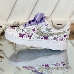 🌸 Step into your special celebration with style and grace, courtesy of our exquisite custom Nike shoes. These sneakers have been transformed to add a touch of elegance to your Sweet Sixteen or Quinceañera party, ensuring you stand out on your big day. 🌸 Who says sneakers can't be both chic and comfortable? We've redefined the rules! Our shoes are designed for dancing the night away without any discomfort. You can twirl and dance until dawn in absolute comfort. 🌸 Customization is at your fingertips! If you prefer a different color or design, simply let us know. We're here to bring your dream shoes to life. 👟 Designs and Texts: You can choose from our provided designs and texts in the personalization section or send us your own heartfelt message. ✨ RIBBON COLOR: If you'd like a different Quinceanera Shoes Purple, Sage Green And Purple Quinceanera Theme, Custom Sneakers With Round Toe For Wedding, Custom Round Toe Sneakers For Wedding, Custom Wedding Sneakers With Round Toe, Customizable Wedding Sneakers With Round Toe, Customizable Round Toe Wedding Shoes, Customizable Round Toe Wedding Shoes For Bridal Shower, Quince Sneakers