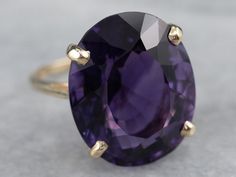 Gold Amethyst Statement Ring Luxury Classic Amethyst Ring, Luxury Classic Amethyst Ring With Polished Finish, Luxury Vintage Amethyst Ring For Formal Occasions, Timeless 14k Gold Amethyst Ring For Anniversary, Classic 14k Gold Purple Amethyst Ring, Elegant Gold Solitaire Amethyst Ring, Elegant 14k Gold Amethyst Ring, Formal 14k Gold Amethyst Ring With Center Stone, Formal Yellow Gold Round-cut Amethyst Ring