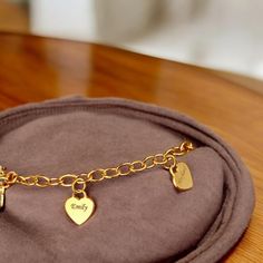 ✨ Searching for the perfect gift that speaks directly from the heart? Our Personalized Heart Charms Bracelet is the ideal way to celebrate the special women in your life--whether it's your mom, grandma, or wife! 💖 💍 Each bracelet is delicately crafted with love, featuring engraved name pendants on dainty heart charms. Customize it with the names of loved ones to create a truly unique piece that they'll cherish forever. Whether it's for Mother's Day, a birthday, or just because, this bracelet is a beautiful reminder of the bond you share. 🌸 🎁 Imagine the joy on her face as she unwraps this thoughtful gift, knowing it was made just for her. This isn't just a piece of jewelry; it's a symbol of love and connection that she can carry with her every day. Perfect for layering or wearing solo, Mother's Day Heart Bracelet With Lobster Clasp, Mother's Day Gift Heart Bracelet With Lobster Clasp, Heart-shaped Charm Bracelet For Personalized Gift, Heart Charm Bracelet For Personalized Gift, Double Heart Charm Bracelet For Mother's Day Gift, Personalized Dainty Charm Bracelet As A Gift For Her, Personalized Heart Charm Bracelet Gift, Personalized Bracelet Charms For Gifts, Engraved Charm Bracelet For Personalized Gift