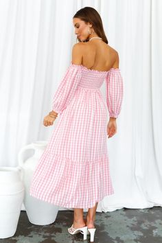 Length from neckline to hem of size S: 101cm. Pink gingham midi dress. Partially lined. Cold hand wash only. Model is a standard XS and is wearing size XS. True to size. Shirred, stretchy top. Lightweight, non-stretchy woven fabric. Adjustable shoulder straps. No zipper. Slip-on style. Rayon. Live the cottagecore dream in our Kiss Me At Sunset Midi Dress! With a sweet gingham print, off-the-shoulder sleeves and ruffled skirt, you'll be running away for a countryside life this summer. Don't forget to style yours with tousled waves, lace-up sandals and a woven bag. Gingham Midi Dress, Countryside Life, Midi Dress Pink, Sunset Rose, Tousled Waves, Ruffled Skirt, Stretchy Tops, Pink Gingham, Pink Midi Dress