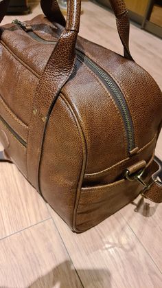 Travel bag made of genuine calfskin, lined with durable material, size 500×300×250mm. Duffel Bags, Latvia, Duffel Bag, Travel Bag, Bag Making, Calf Skin, Ships, Travel