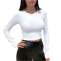 Show off your style with this ribbed crop top! With its soft, ribbed fabric and crew neck, you'll always look cool and be comfortably fashionable. Pair with our High Waist PU Leather Legging. Also available in more colors. Shop more tops & basics!! Model is 5' 3". White Long sleeves Ribbed fabric Cropped Seamless Fitted Crew neckline One size fits most 92% Nylon / 8% Spandex Still not sure which size to get? Ask one of our stylists! Please give us a call at 856-452-5821 during our regular busine White Jumpsuit Dress, Leather Legging, White Long Sleeves, Ribbed Crop Top, Neck Crop Top, White Crop Top, Short Rompers, Clothes Collection, Leather Leggings