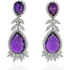 Indulge in the captivating allure of these exquisite Amethyst 18K White Gold 16.00cts Diamond Drop Earrings. Prepare to make a statement as you adorn your ears with these dazzling works of art. Crafted with meticulous attention to detail, these earrings boast a breathtaking design that seamlessly blends sophistication with modern elegance.The centerpiece of these earrings is the enchanting amethyst, radiating a rich and regal purple hue. With a weight of 16.00 carats, this gemstone captivates th