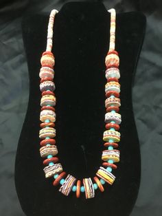 "A beautiful necklace with spiny oyster in orange, yellow and purple, divide with turquoise beads. Measures 30\" long , very colorful." Oyster Necklace, Horse Hair Pottery, Navajo Pottery, Navajo Earrings, Wedding Vases, Yellow And Purple, Crafting Materials, Sewing Buttons, Spiny Oyster