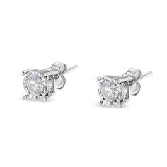 Celebrate any occasion with these classic shimmering diamond stud earrings. Fashioned in .925 sterling silver, each earring showcases a sparkling Ã‚Â¼ carat round, brilliant cut, miracle-set diamond solitaire. The unique miracle-plate setting centers each genuine diamond in a mirror-finish, high-polish frame, giving the illusion of a much larger stone. Dazzling with a bright polished shine, these post earrings secure comfortably with friction posts and butterfly backs. This authentic design is c Affirmation Jewelry, Dressy Sandals, Colorless Diamond, Classic Earrings, Diamond Stud Earrings, Tech Gifts, Diamond Stud, Chains For Men, Round Brilliant Cut Diamond