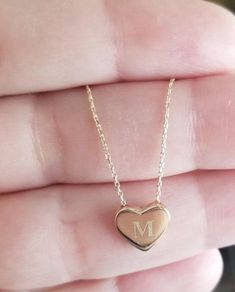 14K SOLID YELLOW GOLD HEART NECKLACE 9MM X 10MM Here is a dainty, delicate and simple, yet classy minimalist Heart Necklace. This is a 14k Solid Yellow Gold open back heart necklace. (We do not sell filled or plated jewelry) Perfect for everyday use. Available also in 14K White Gold. https://www.etsy.com/listing/745041910/14k-white-gold-heart-necklace-minimalist?ref=listings_manager_grid Metal : 14K Solid Gold Necklace Length : 17 inches / 42.5cm Pendant Height : 9.10mm Pendant Width : 10.00mm 9 Everyday 14k Rose Gold Heart Necklace, Everyday Rose Gold 14k Heart Necklace, Simple Gold Charm Necklace For Valentine's Day, Simple Gold Charm Necklace With Heart Pendant, Simple Gold Charm Necklaces With Heart Pendant, Simple Gold Heart Pendant Charm Necklace, Simple 14k Gold Jewelry For Valentine's Day, Simple Gold Necklaces For Valentine's Day, Delicate 14k Gold Necklace For Valentine's Day