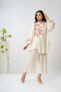 Festive Off-white Palazzo Set With Floral Embroidery, Festive Off White Palazzo Set With Floral Embroidery, Silk Pant Set With Straight Kurta And Floral Embroidery, Silk Pant Set With Floral Embroidery And Straight Kurta, Cream Straight Kurta Set With Floral Embroidery, Silk Pant Set With Floral Embroidery, Off White Palazzo Set With Straight Kurta For Spring, Spring Silk Embroidered Pant Set, Off White Floral Embroidered Sets For Designer Wear