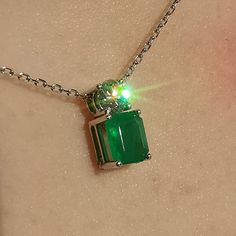 SIZE OF THE PENDANT: 10 mm long 10 mm wide METAL: 14/18 k GOLD WEIGHT: 3.3 grams STONES: diamonds, emeralds DIAMOND: 0.25 ct. CLARITY: VSi COLOR: H EMERALD: 0.75 ct. CONDITION: EXCELLENT Beautiful white gold pendant with a diamond and emerald. The diamond is VSi clarity, H color and 0.25 ct. and the emerald with a stunning green color is 0.75 ct. The pendant weighs 3.3 grams and is 10mm long/wide and the chain is 42cm. This pendant would be a great gift for anyone who likes simple, but elegant d Formal White Gold Emerald Necklace, Luxury Baguette-cut Emerald Necklace For Formal Occasions, Luxury Baguette Cut Emerald Necklace For Formal Occasions, Elegant Baguette Cut Emerald Necklace For Formal Events, Elegant Baguette Cut Emerald Necklace For Formal Occasions, Elegant Formal Baguette-cut Emerald Necklace, Formal Fine Jewelry Emerald Necklace With Baguette Cut, Formal Fine Jewelry Baguette Cut Emerald Necklace, Formal Baguette Cut Emerald Necklace In Fine Jewelry Style