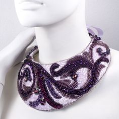 Purple embroidered necklace. Beaded collar. Bridal boho style necklace. Statement necklace. Choker necklace. Dimensions: 2,75 inches (7 cm) wide at the widest point, 13,4 inches (34 cm) long + 24.4 inches (62cm) ribbon from each side. Closure - velour ribbon. Materials: Czech beads, Japanese beads, crystals, beads of different shapes, sequins, eco-suede, ribbon. We will pack securely and ship within 1-2 business days. An elegant and sophisticated purple embroidered necklace with a stunning combi Boho Style Necklaces, Embroidered Necklace, Hippie Necklace, Beaded Collar, Boho Bridal, Necklace Beaded, Necklace Statement, Necklace Choker, Czech Beads