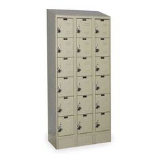 a large metal locker with many compartments