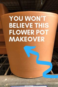 a flower pot with a blue arrow pointing to the right and you won't believe this flower pot makeover