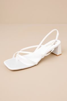 Subtly sultry and always chic, the Lulus Kerrie White Satin Strappy Low Heel Sandals will add a luxe to touch to any ensemble! Sleek woven satin shapes these unforgettable heels that have a square footbed, a thong-style upper, and a network of slender straps throughout. A matching, adjustable slingback strap secures with a shiny gold buckle, all atop cute block heel. 2" wrapped block heel. Cushioned insole. Felted rubber sole has nonskid markings. Man made materials. Imported. Lulus | Kerrie Whi White Low Heels, White Sandals Heels, White Kittens, Low Heel Sandals, Sandal Heels, Silky Dress, Black Sandals Heels, White Heels, Wedding Heels