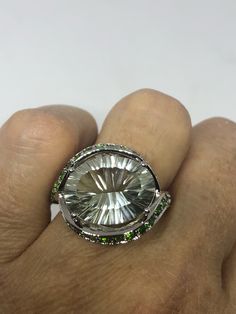 Vintage Handmade Green Chrome Diopside and Green Amethyst Filigree Setting Sterling Silver Gothic Ring https://www.etsy.com/listing/595873756/vintage-handmade-green-chrome-diopside Luxury Peridot Multi-stone Jewelry, Luxury Multi-stone Peridot Jewelry, Formal Green Amethyst Ring With Gemstone Accents, Fine Jewelry With Green Amethyst, Luxury Silver Emerald Ring With Gemstone Accents, Green Multi-stone Amethyst Ring, Oval Emerald Ring In Silver With Multi-stone, Oval Silver Emerald Ring With Multi-stone, Unique Green Gemstones For Formal Occasions