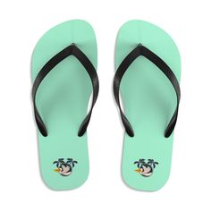 Let your feet breathe! With a high quality print, these Flip Flops are a must-have item on the beach, around the house or to brighten up a special outfit on hot summer days. .: 100% Rubber sole .: 100% Polyester jersey sole cover .: Multiple sizes .: Textured black thong strap .: Runs bigger than usual Green Casual Flip Flops For Vacation, Casual Green Flip Flops For Vacation, Sporty Flip Flops For Summer Vacation, Breathable Comfortable Flip Flops For Vacation, Green Casual Flip Flops For Beach Season, Sporty Summer Flip Flops For Vacation, Casual Green Flip Flops For Beach Season, Sporty Summer Vacation Flip Flops, Green Graphic Print Swimwear For Summer