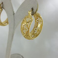 💎 Finely Crafted Jewelry. Made by master goldsmiths in Istanbul in our workshop. ❤️ Enjoy 18K gold for Less! What you see is gold, what touches your skin is 18k gold. ✓ Instant Glamour and Comfort - Statement Hoop Earrings ✓ Classic Timeless Filigree Hoop Earrings Design ✓ Length: 30 mm | 6/5 inch ✓ Width: 10 mm | 2/5 inch 100% Customer satisfaction guaranteed! Hassle free returns or exchanges. Reach out if you have any special requests and we'll make it happen! OTHER INFORMATION ✓ All items ar Italian Gold Earrings, Arab Gold, Hoop Earrings Design, Pakistani Jewellery, Byzantine Jewelry, Filigree Hoop Earrings, Statement Hoop Earrings, Earrings Classic, Earrings Design