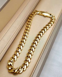 --- Crafted in GUARANTEED HIGH-QUALITY 18-Karat GOLD -- Pure Gold Material, Not Gold-Filled or Plated --- ** Bracelet options base on their lengths, thickness and weights: 7 inches - 7 millimeters: 9.44 grams 7.5 inches - 7 millimeters: 10.02 grams 8 inches - 7 millimeters: 10.70 grams 8.5 inches - 7 millimeters: 11.36 grams 9 inches - 7 millimeters: 12.35 grams Closure: Box lock clasp (Strong and Durable) Chain style: 18 Karat Miami Cuban Monaco Bracelet Please feel free to message me for any custom sizing request! Check out the matching chain necklace here 👇 https://www.etsy.com/ca/listing/1737320893/18k-solid-gold-miami-cuban-chain-and?click_key=a506bfb94791dd2b5b25e0179d93ba47ea4df778%3A1737320893&click_sum=907dbe2d&ref=shop_home_active_1&frs=1&sts=1 𝙋𝙧𝙤𝙙𝙪𝙘𝙩 𝘿𝙚𝙨𝙘𝙧𝙞𝙥𝙩𝙞? Luxury Cuban Link Bracelet As Gift, Luxury Cuban Link Chain Bracelet As Gift, Luxury Curb Chain Bracelet, Luxury Gold Chain Bracelet With Cuban Link, Luxury Cuban Link Bracelet As Gift With Solid Construction, Luxury Cuban Link Gold Chain Bracelets, Luxury Cuban Link Gold Chain Bracelet, Luxury Curb Chain Cuban Link Bracelet, Luxury Curb Chain Bracelet As Gift