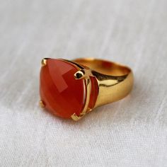 D E T A I L S - Material: Sterling Silver 925Stone: CarnelianThe Fit: True to US ring size Finish: Smooth and gold-filled to a high shineUpgrade your accessory collection today with this must-have piece, & flaunt your style statementS H I P P I N G & P R O D U C T I O N - My current production time is 2-6 business days, which means after those days are up, your order ships! I make everything custom to order, by hand, but I promise you it's worth the wait!R U S H - M Y - O R D E R -If you Classic Carnelian Rings With Polished Finish, Amber Rings With Large Stone For Anniversary, Classic Orange Ring Jewelry, Orange Fine Jewelry Rings As A Gift, Fine Jewelry Orange Rings For Gift, Orange Rings Fine Jewelry For Gift, Orange Fine Jewelry Rings For Gifts, Carnelian Amber Rings For Gifts, Classic Chalcedony Ring Jewelry