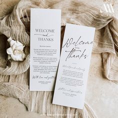 two wedding programs are laying next to each other