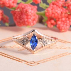 "Unique dainty 14k rose & white gold art deco blue sapphire promise ring for her, Antique womens sapphire engagement ring,Womens promise ring WE OFFER UNLIMITED PERIOD INSTALLMENTS PLAN This is a beautiful, stunning, feminine ring that works well for all occasions, styles, and ages. You will love it! Same ring in white gold: https://www.etsy.com/listing/294832061/topaz-ring-art-deco-ring-gemstone-ring?ref=shop_home_active_1 Ring information: Main stone: Blue Sapphire Approximate size: 6*3 mm Sapphire Diamond Cut Promise Ring Jewelry, Elegant Rose Gold Sapphire Diamond Ring, 14k Gold Marquise Cut Sapphire Promise Ring, Dainty Cubic Zirconia Sapphire Promise Ring, Marquise Sapphire Promise Ring Jewelry, 14k Gold Sapphire Marquise Cut Promise Ring, Elegant Stackable Sapphire Rings With Rose Cut Diamonds, Sapphire Diamond Promise Ring In 14k White Gold, Dainty Sapphire Diamond Promise Ring