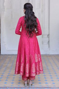 Fuchsia pink full sleeves flared anarkali crafted in moonga silk with all over gold toned peony fleur butti and macro paisley bloom woven details on the border. Paired with a matching straight pant and dupatta with thread tassel embellishments on the border. - Aza Fashions Pink Anarkali Kurta For Transitional Season, Pink Anarkali Kurta For Seasonal Transition, Bollywood Style Anarkali Set With Long Sleeves For Diwali, Long Sleeve Kurta For Navratri Reception, Bollywood Style Long Sleeve Anarkali Set For Diwali, Long Sleeve Anarkali Set For Reception And Festivals, Diwali Reception Anarkali Set With Long Sleeves, Anarkali Kurta With Pallu And Long Sleeves, Anarkali Salwar Kameez With Long Sleeves For Reception