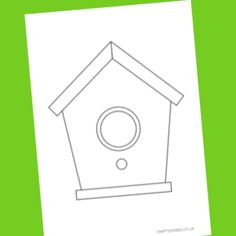 a birdhouse is shown on a green background