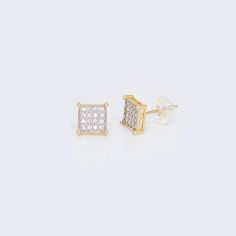 Add a touch of elegance to your jewelry collection with these stunning 14K CZ Womens Round Diamond Square Earrings. Made with high-quality 14K yellow gold, these earrings are both durable and luxurious. The round diamond shape adds a classic and timeless touch, while the square design adds a modern twist. The stones used are cubic zirconia, giving the earrings a brilliant and sparkling appearance. These earrings are perfect for any occasion, whether it's a formal event or a casual outing. They a Cubic Zirconia Bracelet, Cubic Zirconia Necklace, Cubic Zirconia Earrings, Cubic Zirconia Rings, Cz Earrings, Zirconia Earrings, Square Earrings, Women Diamond, Earring Sale