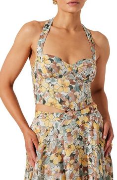 Tap into garden party style with this bustier top cut in a modern cropped silhouette. Halter neck Sleeveless 70% viscose, 30% nylon Dry clean Imported Fitted Halter Neck Top For Brunch, Fitted Floral Print Halter Neck Tank Top, Fitted Halter Neck Tank Top With Floral Print, Fitted Tube Top For Brunch, Fitted Crop Top With Sweetheart Neckline For Spring, Strapless Fitted Crop Top For Spring, Spring Bandeau Crop Top With Built-in Bra, Fitted Strapless Crop Top For Spring, Spring Cropped Tube Top With Built-in Bra