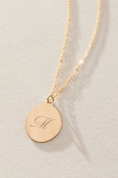 Just as effortless as it is elegant, this stunning necklace features an oval pendant with gorgeous cursive engraved initial for the ideal finishing touch. * 14k Gold Filled chain * Personalized, laser engraved, 14k Gold Filled 17x22mm oval pendant * Length: 20" * 5 days of production | Set & Stones Personalized Amelia Necklace at Free People in Gold Elegant Personalized Initial Necklace For Formal Occasions, Elegant Oval Pendant Charm Necklaces, Tarnish Resistant, Elegant Oval Pendant Charm Necklace That Is Tarnish Resistant, Elegant Oval Pendant Charm Necklace, Tarnish Resistant, Elegant Pendant Initial Necklace Tarnish Resistant, Personalized Oval Gold Necklaces, Elegant 14k Stamped Initial Necklace For Anniversary, Elegant Personalized Charm Necklace For Formal Occasions, Elegant Personalized Charm Necklace For Formal Events