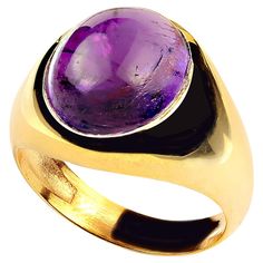 Elegant ring of oval Amethyst cabochon of 8.28ct in a custom bezel setting of gold rhodium over Sterling Silver. The ring is perfect for daily and on into evening wear. Amethyst is the February birthstone and is said to protect from intoxication and evil spells. It will calm your spirit and give you focus. Pure quartz is colorless, but the most prized variety is Amethyst, the purple variety. It's always been considered a 'royal color' and is featured in the British Crown jewels. It was also a favorite of Catherine the Great and Egyptian royalty. For centuries this beautiful gemstone has been considered a symbol of power. No changes by seller. Sizable 8 which you local jeweler should be able to make. MR2313 Luxury Oval Cabochon Gemstones For Anniversary, Formal Cabochon Round Gemstone, Luxury Oval Cabochon Gemstones, Classic Round Cabochon Gemstones, Luxury Oval Gemstone Cabochons, Luxury Yellow Gold Oval Cabochon Gemstones, Luxury Cabochons With Bezel Setting, Modern Oval Jewelry With Polished Edges, Modern Jewelry With Oval Cabochon Bezel Setting