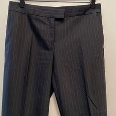 This Is A Beautifully Made Pair Of Slacks From Ann Taylor. Just A Little Too Tight On Me. 53% Polyester, 43% Wool, 4% Spandex. Dry Clean. Classic Tailored Bottoms With Vertical Stripes, Tailored Vertical Stripe Pants For Business, Tailored Vertical Stripe Business Pants, Business Tailored Vertical Stripes Pants, Classic Striped Dress Pants For Formal Occasions, Classic Tailored Striped Dress Pants, Classic Striped Dress Pants For Business, Classic Striped Formal Bottoms, Formal Tailored Pants With Vertical Stripes