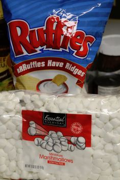 bags of marshmallows sitting on top of a counter