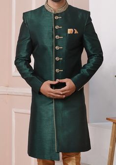 Ready-Made Sherwani With Trouser. Art Banarasi Fabric Top. Art Dupion Aligarhi Ready Made Trouser. Crafted in Chinese Collar Neck, and Full Sleeve. Faux Satin Lining with Plain Work. High-Quality Matching Buttons. Please Note: The footwear shown in the picture is for presentation and photography purpose only. Color: There might be slight color variation due to lightings and flashes while photo shooting. The color may also vary because of different screen resolutions. Wash Care: Dry Clean Only. Gents Party Wear Men's Fashion, Fitted Bandhgala For Festive Occasions Like Diwali, Green Raw Silk Straight Kurta Bandhgala, Designer Green Raw Silk Bandhgala, Green Raw Silk Designer Bandhgala, Green Semi-stitched Bandhgala With Resham Embroidery, Festive Green Raw Silk Bandhgala, Transitional Floor-length Kurta With Dabka, Transitional Floor-length Dabka Kurta