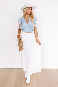 - Say in the summer breeze with this flowy maxi skirt! - Fully lined material - A stretchy elastic waistline - A flowy silhouette that ends in a maxi skirt length hemline Measurements S : Hip 36", Length 36.5", Waist 27". M : Hip 38", Length 36.5", Waist 29". L : Hip 40", Length 37", Waist 31". Chic Summer Maxi Skirt With Elastic Waistband, Rayon Tiered Maxi Skirt For Day Out, Flowy Maxi Skirt With Elastic Waistband For Summer, Day Out Tiered Maxi Skirt, Summer Rayon Lined Maxi Skirt, Flowy Wide Leg Maxi Skirt For Spring, Breezy Flowy Maxi Skirt With Elastic Waistband, Summer Day Out Maxi Skirt With Elastic Waistband, Chic Tiered Maxi Skirt For Beach