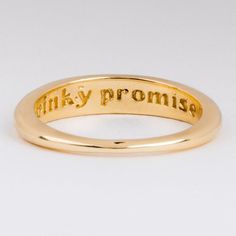 The Pinky Promise Ring is a perfectly discreet reminder of that promise to a friend or to yourself. Inscribed on the inside with the words "pinky promise" this little cutie is an adorable pinky ring, or minimal addition to any stack. 14K gold plated Brass base  3.7mm height in front 1.3mm in back 1mm band width Model w Luxury Timeless Initial Promise Ring, Cheap Customizable Initial Promise Ring, Cheap Sentimental Initial Ring For Promise, Cheap Yellow Gold Initial Promise Ring, Cheap Name Rings For Promise, Simple Personalized Rings At A Cheap Price, Cheap Symbolic Promise Ring, Cheap Gold Engraved Promise Ring, Cheap Initial Ring For Promise