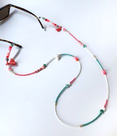 Handmade Beaded Glasses Chain,Seashell Sunglasses Strap, Eye Glass Holder,Boho Hippie Mask Chain,Summer Jewelry,Miyuki Seed Beads Lanyards If you are tired of playing hide and seek with your glasses and masks, there is a colorful news for you! Thanks to our handmade eyeglass straps, which make it almost impossible to lose glasses and give life to boring frames, you can wear your glasses comfortably by hanging them on your neck when not wearing them. It completes your full BOHO chic look! You can Bohemian Beaded Necklaces With Heart Beads For Beach, Beaded Chain Jewelry With Round Beads For Beach, Beach Jewelry With Beaded Chain And Round Beads, Bohemian Beaded Necklaces With Heart Beads For Summer, Bohemian Beaded Necklace With Heart Beads For Beach, Bohemian Beaded Necklace With Heart Beads For Summer, Bohemian Necklace With Heart Beads For Summer, Bohemian Heart Beads Necklace For Summer, Summer Bohemian Beaded Necklace With Heart Beads