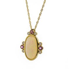 A naturally iridescent 11.03ct white opal stone is set in a rich 18K yellow gold pendant with sweet tourmaline and diamond accents in this one-of-a-kind vintage necklace. Featuring .32ctw of pink tourmaline and .10ct of natural diamond, graded F-G in color and VS in clarity. On a 15" twisted rope chain in solid 18K yellow gold. Secures with a classic spring ring closure. Community Support, Vs Diamond, Opal Stone, Rope Necklace, Pink Accents, Yellow Gold Pendants, Diamond Pendant Necklace, White Opal, Rope Chain