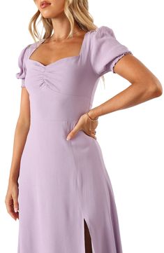 Charming puff sleeves frame this day-to-night dress designed with a sweetheart neck and a flared skirt. Hidden back-zip closure Sweetheart neck Short sleeves Unlined 50% rayon, 50% viscose Hand wash, dry flat Imported Purple Puff Sleeve Dress, Winter Bridesmaid, Purple Satin Dress, Short Sleeve Bridesmaid Dress, Winter Bridesmaids, Winter Bridesmaid Dresses, Petal And Pup, Banquet Dresses, Day To Night Dresses