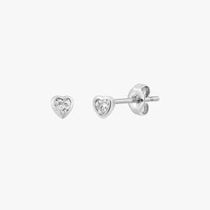 Add a bit of sparkle to your ear stack with a dainty heart stud! Exude love with the Mini Sparkle Heart Stud Earrings! Material 18K Gold over eco brass. 925 Sterling Silver. Cubic Zirconia. Nickel free. Suitable for sensitive skin. Quantity & Measurement A pair of heart stud earrings with ear nuts Heart: 4mm Silver: 925 Sterling Silver Gold: 18 Karat Gold plated over eco brass * Earrings for layering purposes only. Sold separately. Skz Concert, Ear Stack, Heart Stud Earrings, Heart Studs, Accessories Jewelry Earrings, Heart Earrings Studs, Brass Earrings, Gold Earrings Studs, Silver Earrings Studs