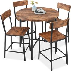 a round table with four chairs around it