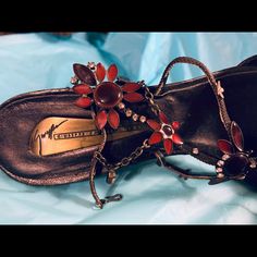 Beautiful Sandals Brown With Red Flower Jewels And Ankle Straps Summer Red Flower-shaped Jewelry, Giuseppe Zanotti Heels Flower, Red Flower-shaped Spring Jewelry, Bohemian Red Flower Pendant Jewelry, Red Flower-shaped Gemstone Jewelry, Brown With Red, Design Sandals, Sandals Brown, Zanotti Shoes